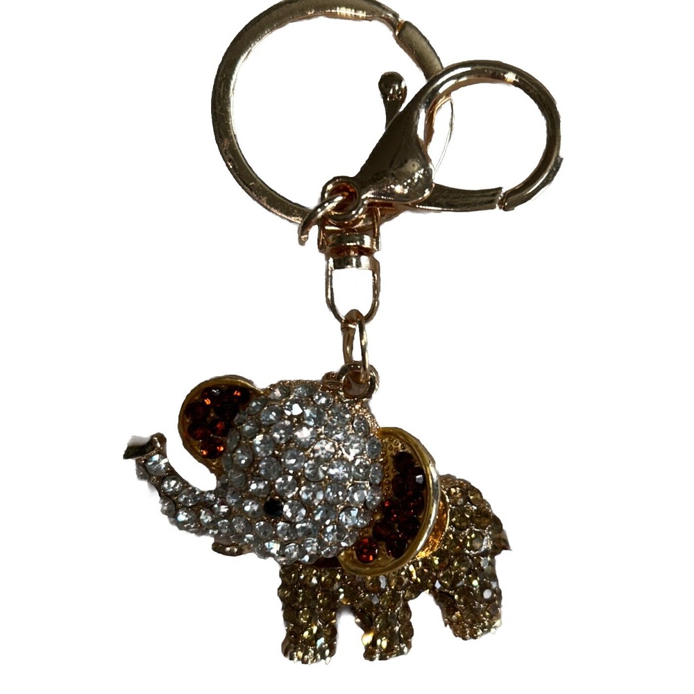 Goldtone And Rhinestone Elephant Keychain With Caged Backside.